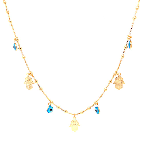 The Hamsa Hands and Blue Evil Eye Charms Pendant Necklace is a delicate piece crafted from 14k gold-filled material, featuring small Hamsa hand charms and blue evil eye pendants evenly distributed along the chain.